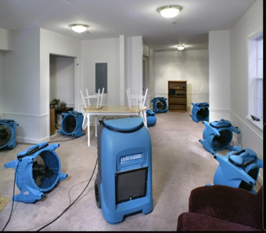 Air movers and dehumidifier setup for Water Damage Restoration in Hampton